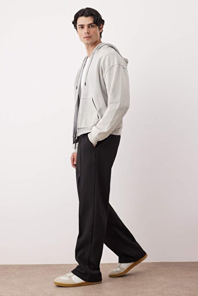 Trendyol Collection Czarne proste spodnie z szerokimi nogawkami, interlock, wygodne bawełniane spodnie TMNAW26PL00002