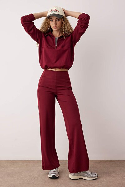 Trendyol Collection Πλεκτό αθλητικό παντελόνι από ύφασμα μπορντό με αντανακλαστικό σχέδιο THMAW26EA00004