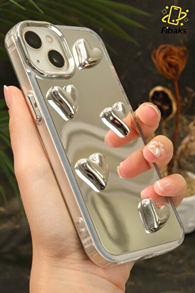 Fibaks حافظة متوافقة مع آيفون 13 - 14 - 15، غطاء سيليكون ممتص للصدمات بنمط قلب ثلاثي الأبعاد فضي عاكس