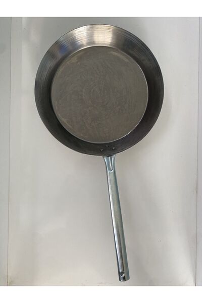 Lider مقلاة سوداء مقاس 33 سم - عملية حرق مقلاة السمك قبل الاستخدام في الوصف