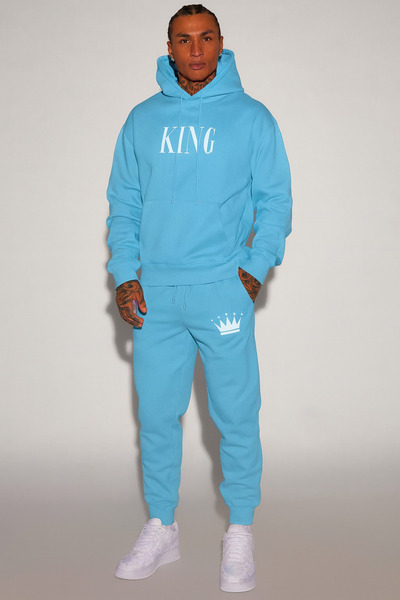 CLASSY.MODA Σετ φόρμας Unisex με 3 κλωστές, κουκούλα, τσέπες καγκουρό, στάμπα KING και λεπτομέρεια κορώνας