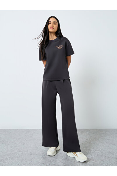 Styli Solid Mid Rise Wide Leg Pants