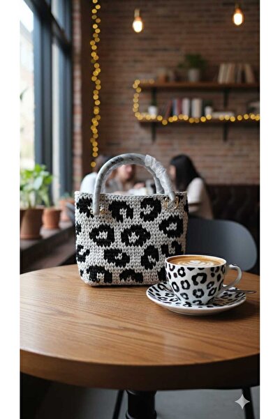 bi ters bi düz حقيبة يد صغيرة من إلورجوسو بتصميم الفهد