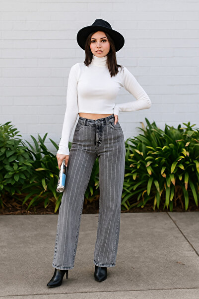 ŞIK VE MUTLU بنطلون جينز بتفاصيل حجرية وشريط علوي مرتفع الخصر