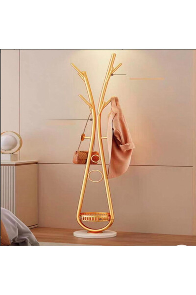 Un Modern clothes hanger with elegant artistic design and practical storage base