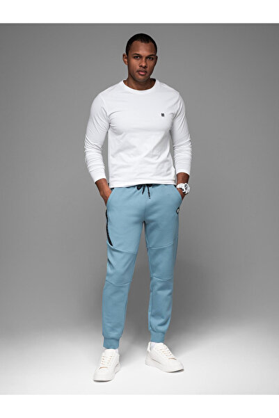 OMBRE Men's sweatpants with ribbed cuffs and decorative zipper - light blue V4 OM-PASK-0226 XXL