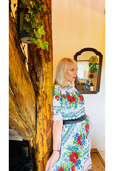 Ie Traditionala Traditional dress stylized with poppies