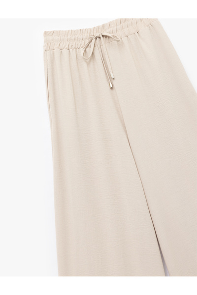Koton Aerobin Kumaş Beli Bağcıklı Cepli Geniş Paça Palazzo Pantolon