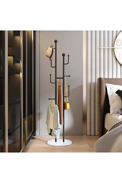 Un Vertical clothes rack with a modern and elegant design for entryways and bedrooms.