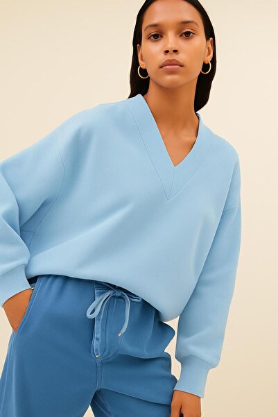 DM DOLCE MORE سترة رياضية بياقة على شكل حرف V للجنسين