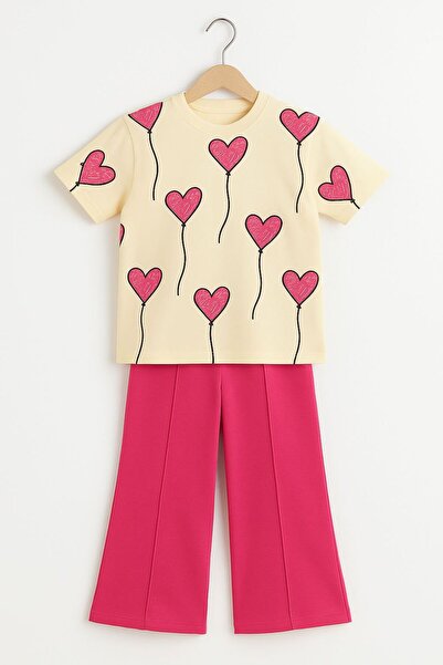 tunays shopping طقم ملابس للفتيات مكون من قميص وسروال بطباعة قلب إسباني