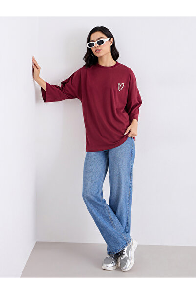 Styli Women Oversized Fit Longline Slogan T-Shirt