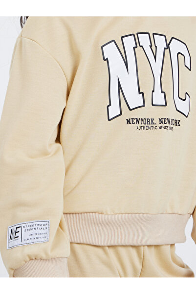 Styli Girls Beige NYC Print Sweatshirt and Joggers Set