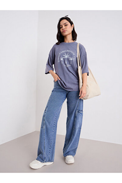 Styli تي شيرت قصة فضفاضة بطباعة جرافيكية ومغسول بالحمض