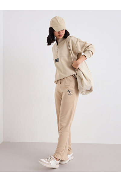 Styli بنطال رياضي أرجل واسعة باللون البيج مع رباط