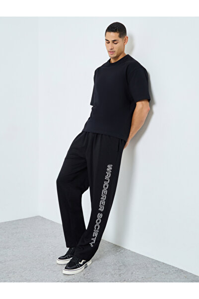 Styli Men Slogan Print Relaxed Fit Terry Joggers