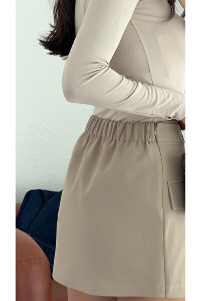 HAZELANNA Fusta scurtă bej cu cataramă cu cârlig