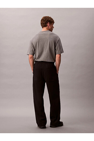 Calvin Klein Erkek Yüksek Lastikli Bel Geniş Paça Cep Detay Pamuklu Siyah Eşofman Altı LV04LD239G-UB1