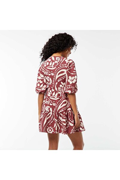 KIABI Short patterned dress with 3/4 length sleeves RED