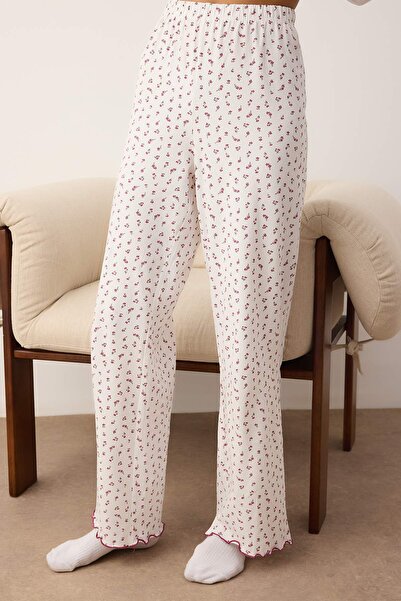 Trendyol Collection Marineblau-weiße, zweiteilige, gestrickte Pyjamahose aus geblümter Baumwolle mit Lycra und Single-Jersey-Strick THMAW26PJ00005