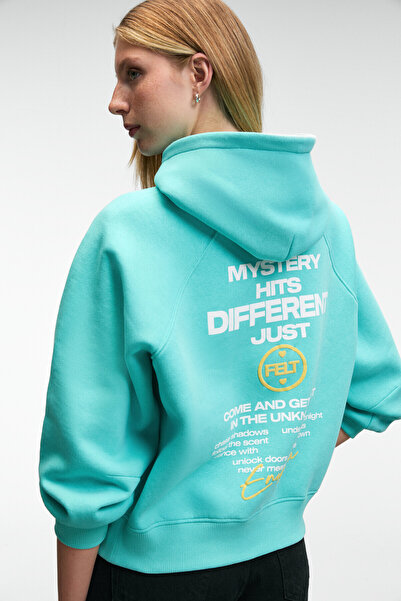 GRIMELANGE ORINQUE Γυναικείο φούτερ με κουκούλα με λεπτομέρεια με στάμπα και κέντημα σε τυρκουάζ υπερμεγέθη