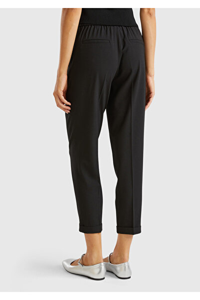 United Colors of Benetton Pantaloni negri pentru femei, din amestec de viscoză, cu tivul îndoit la lateral și la spate