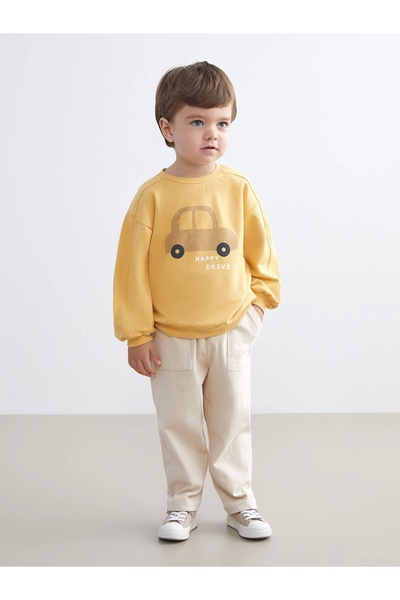 LC Waikiki طقم سويت شيرت وبنطلون رياضي للأطفال الرضع مطبوع عليه LCW baby Sari...