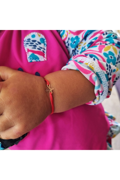 Wild Bracelets 14k gold baby bracelet with cross charm, adjustable from red silk cord, 100% handmade