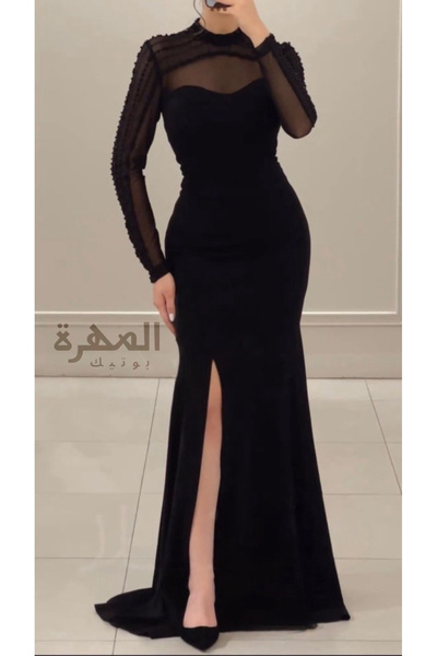 Al Mahra Boutique Classic black evening dress with a mermaid cut and sheer sleeves