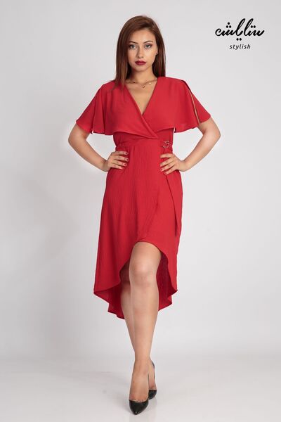 Stylish A short red dress with short sleeves and an innovative cut for a soft, feminine look.