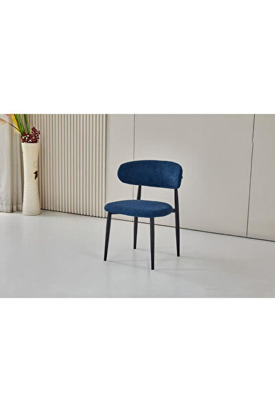 DEC30 A single boucle chair with a luxurious and distinctive design