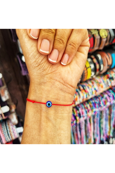 Wild Bracelets Adult flat evil eye bracelet, adjustable from red silk cord