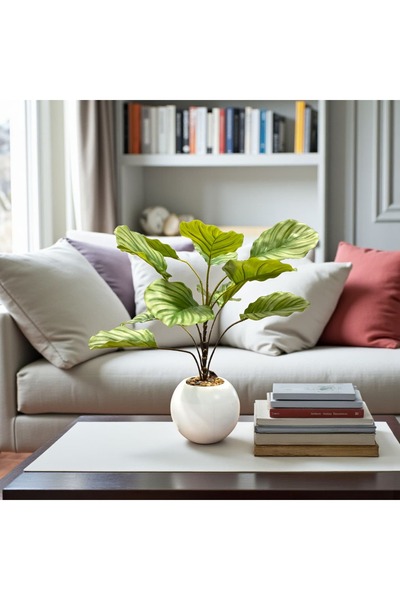 Casco Artificial plant with tropical leaves in a round pot