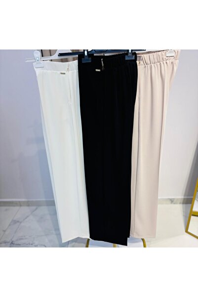 Famelin بنطلون قماش واسع الساق من EKRU