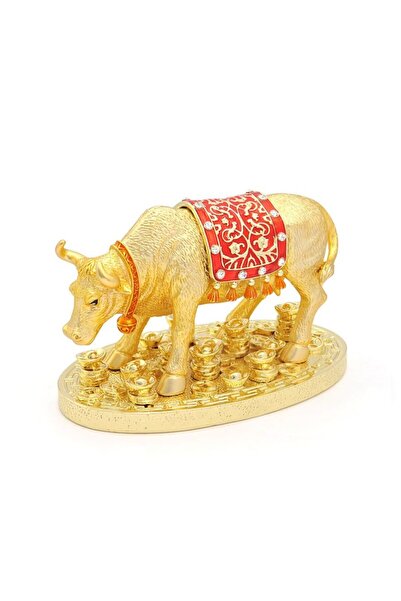 Feng Shui Golden buffalo statuette on coins and nuggets
