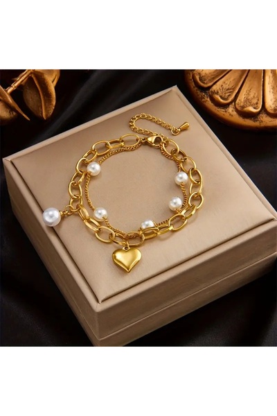 Ayzen Double-layered heart-detailed pearl bracelet.
