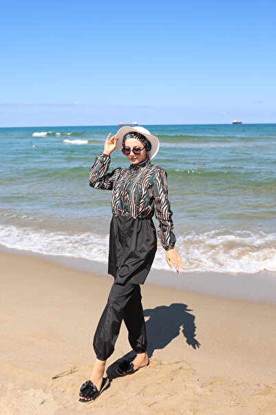 DLC Tekstil Sahra Bought a Set of 3 Adjustable Elastic Hijab Swimwear.