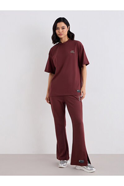 Styli Women Oversized T-Shirt and Flared Leggings Co-Ords