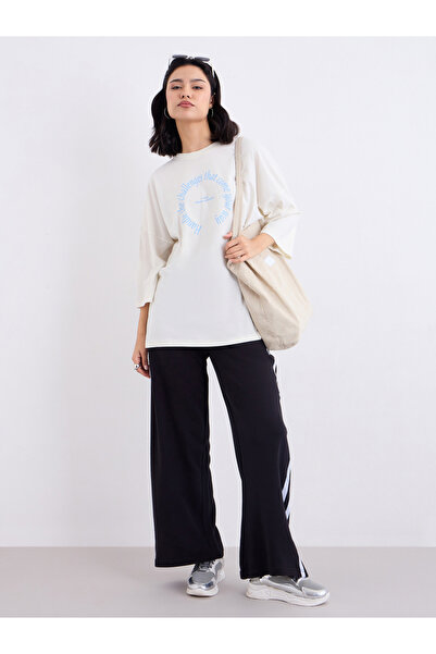 Styli Cream Oversized Slogan Print T-Shirt