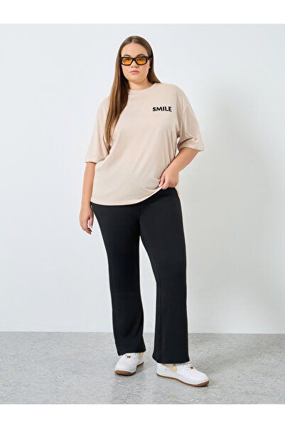 Styli Women Plus Size Flared Black Leggings