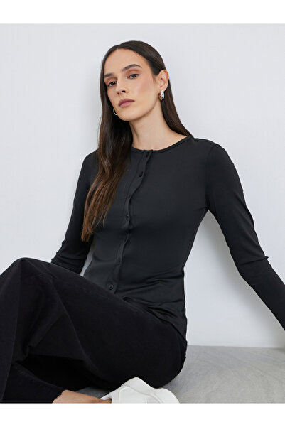 Styli بلوزة نسائية سوداء محبوكة بأكمام طويلة