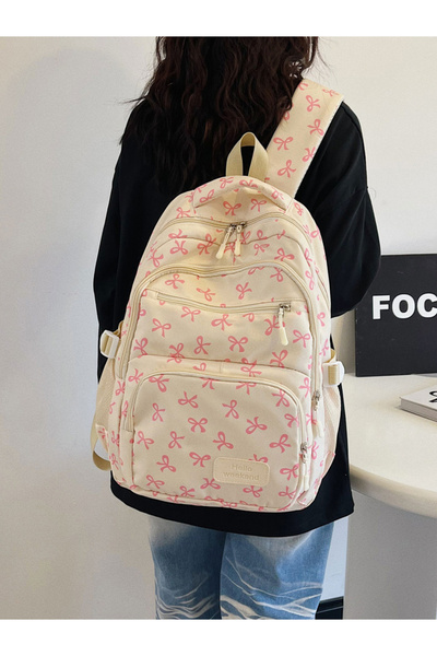 Take Two By Styli مجموعة حقيبة ظهر مطبوعة برسومات جرافيكية مع حقيبة كتف ومحفظة