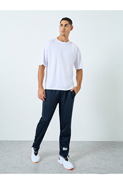 Styli Ultra Soft Slim Pintuck Athleisure Joggers with Badge Detail