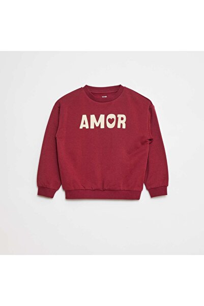 KIABI سويت شيرت بأكمام طويلة مع طباعة باللون الأحمر