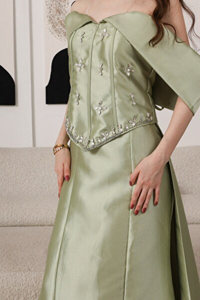 Generic Light green off-shoulder evening dress with crystal embroidered in a royal design