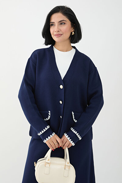 InStyle Трикотажний костюм темно-синього кольору з детальною спідницею