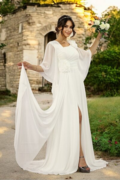 FaBe Fashion ASİMETRİK YAKA GENİŞ VOLAN KOLLU BELİ VE OMZU ÇİÇEKLİ YIRTMAÇLI ŞİFON NİKAH VE DIŞ ÇEKİM ELBİSESİ