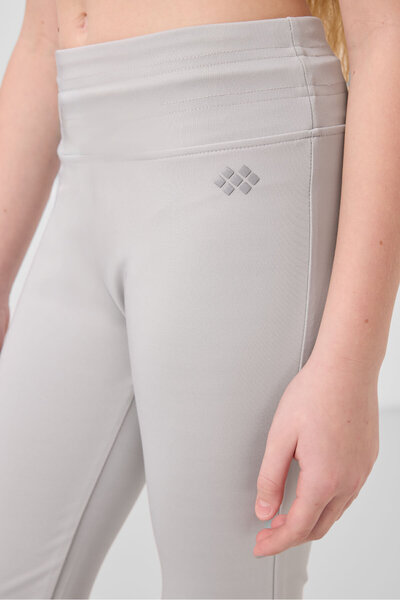 TOMMY LIFE Еластичні штани з камуфляжним принтом для дівчаток - 75193