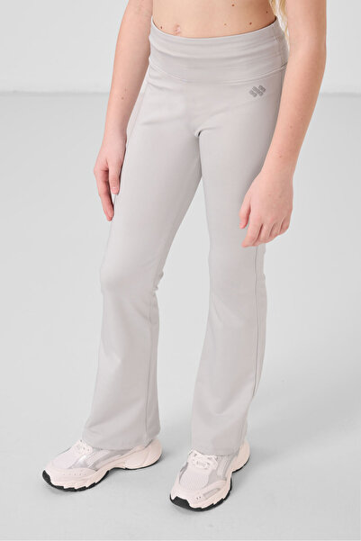 TOMMY LIFE Еластичні штани з камуфляжним принтом для дівчаток - 75193