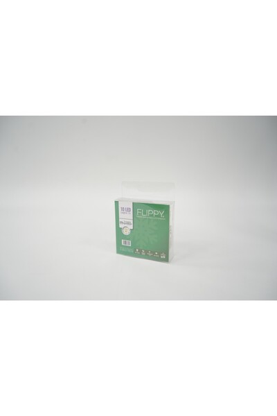 Flippy Χριστουγεννιάτικη εγκατάσταση με στολίδι σε σχήμα ημισελήνου και αστέρ...